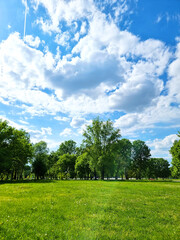 A large green par area on a sunny day at Bundek city park, Zagreb, Croatia