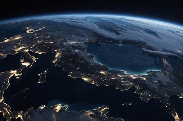 Earth from space at night with city lights illuminating the planet