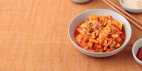 Kimchi, Kimchee in the Bowl, Red Spicy Kim Chi, Hot Fermented Napa Cabbage, Traditional Jimchi on a table
