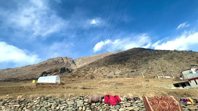 MANALI, INDIA - January 9, 2024: Beautiful journey between the snow mountains of Rohtang Pass in Himalayas.Snow mountains landscape.Winter ride between snow mountains.Beautiful snow mountains.