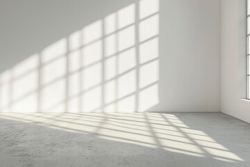 Obraz premium Window Light Casting Geometric Shadows on a White Wall and Floor