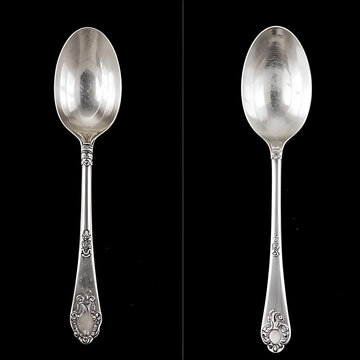 Fork, spoon, silver spoon, silver fork, plastic fork, plastic spoon, wooden spoon, wooden fork. Kitchen utensils on black background. Silver spoon on black background 