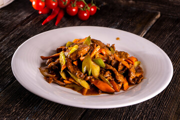 Chinese vegetables with beans on a wooden background. Food concept. Chinese food.