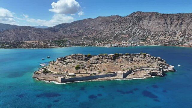 Spinalonga high quality drone video 4K. High quality 4k footageThis video showcases stunning aerial footage of Spinalonga Island, located off the coast of Crete, Greece. The video highlights the