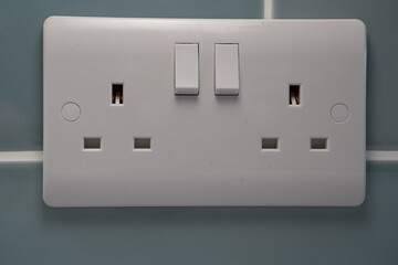 electrical outlet on a wall., UK