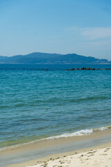 View of Playa de Samil, the main beach of Vigo in Galicia in northwest Spain. Sunny day, crystal...