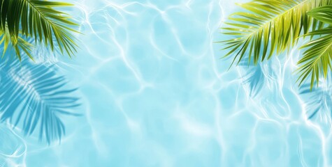A tranquil view of clear blue water with tropical palm leaves gently framing the scene, evoking a serene and inviting atmosphere.