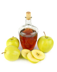 Apple cider in a vintage bottle and fresh apples isolated on a white background.