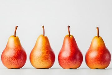 Four ripe, red pears are neatly arranged in a row against a plain background, showcasing their smooth texture and vibrant color.