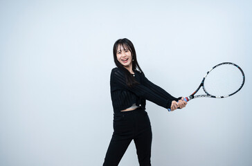 テニスをする女性