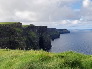 Rugged Cliffs Of Moher: A Dramatic Irish Coastline Meeting The Ocean