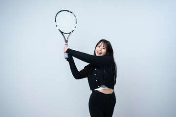テニスをする女性