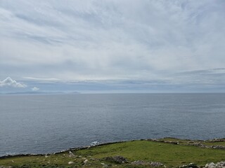 Serene River Waterscape With Little Waves And Cloud Reflections