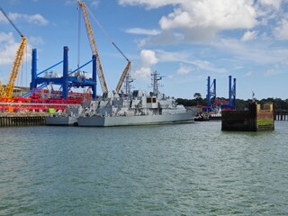 Tranquil Waterscape: A Peaceful River Reflecting Clouds With Gentle Waves