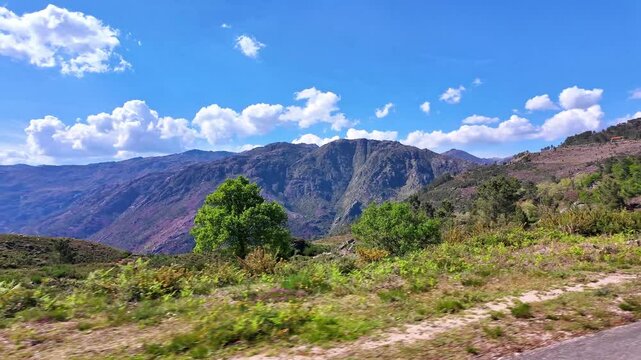 Driving with the car through the Peneda Geres National Park in Portugal, Europe. Area betweeen Cabril und Ruivaes