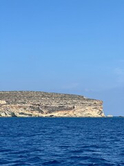 Island and different shades of blue 
