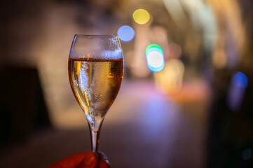 Celebration, night club with party lights and glass of champagne sparkling wine, dancing with wine, wedding event