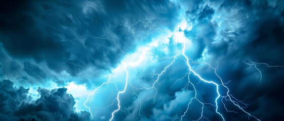 A spectacular lightning storm electrifies the sky, with jagged bolts illuminating the tumultuous clouds in an explosion of blue and white light.