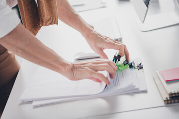 Cropped photo of smart elderly chief sort papers documents resume cv female wear formalwear modern office room interior indoors workspace
