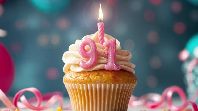 Birthday cupcake with burning lit candle with number 91. Number ninety-one for ninety-one years or ninety-first anniversary.