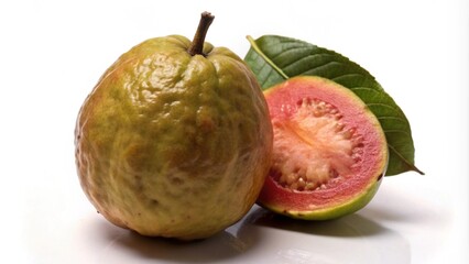 A whole guava and a halved guava with leaves on a white background.