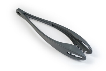 Long handled plastic kitchen locking tongs on white background