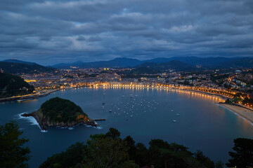 Panoramic view of the city from Monte Igueldo after sunset, San Sebastian, Spain. 