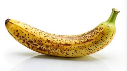 A single ripe yellow banana with brown spots on white background.