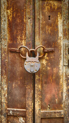 Fototapeta premium Trabzon's old rusty iron inn doors and locks