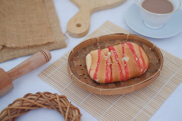 Strawberry bread with chocolate drink  on white background