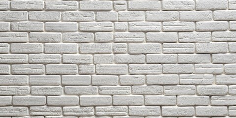 Obraz premium A Close-Up View of a Textured White Brick Wall, Exuding a Simple Yet Elegant Aesthetic