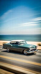 Vintage car going in a high way next to the ocean