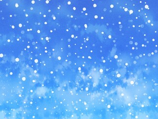 雪が降る青色の空