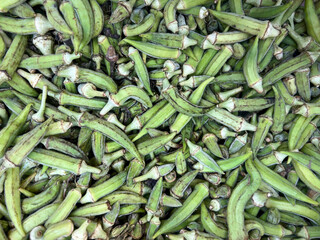 vegetable background with fresh raw okras