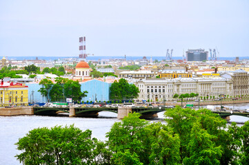 Fototapeta premium St Petersburg, Russia. Panorama of Vasilyevsky Island with historical buildings and water area of Neva river in St Petersburg, Russia - view from height