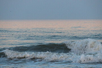 Avalon, New Jersey - Atlantic Ocean waves breaking onto the waters edge of this jersey shore beach at blue hour 