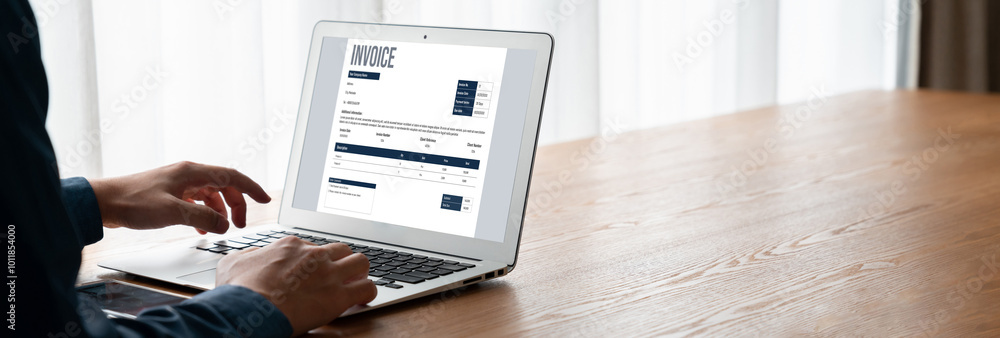 Poster invoice on computer screen from accounting application. computer program for financial and budget of