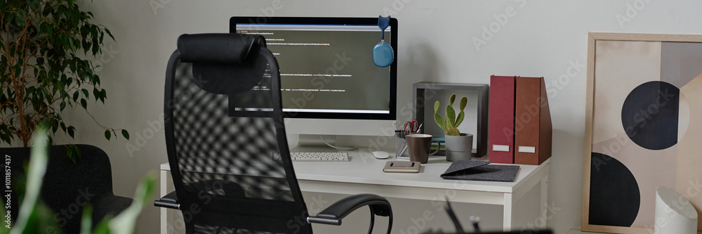 Wall mural website banner of empty it office with work desk and computer on top