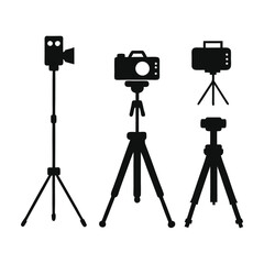 Camera on a tripod silhouette on a white background