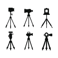 Camera on a tripod silhouette on a white background