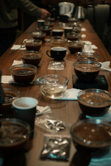 coffee cupping. coffee cupping is the process of observing the taste before the coffee arrives in the cup of the coffee connoisseur.
