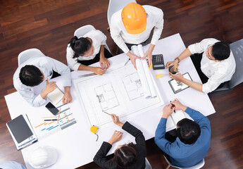 Top view banner of diverse group of civil engineer and client working together on architectural...