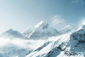Obraz premium The mountains are covered in snow and the sky is clear