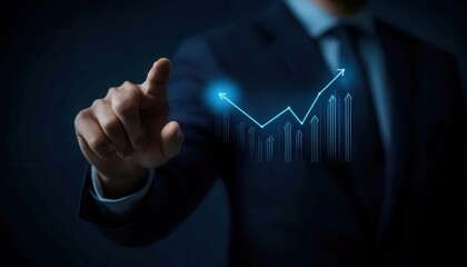 Businessman pointing at an upward growing graph indicating positive financial growth and successful business strategy
