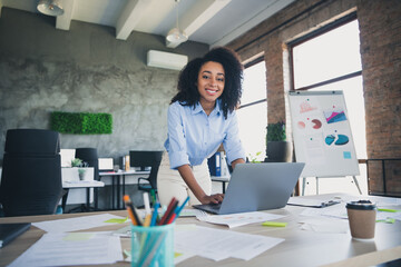 Photo of positive good mood lady specialist dressed shirt texting emails modern device indoors...