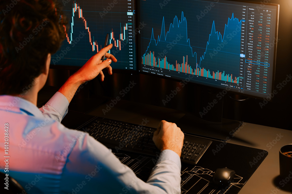 Poster working young business trader pointing on market stock graph data planning in real time monitor with