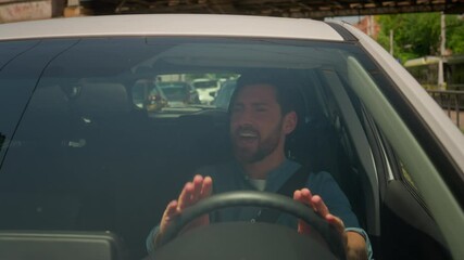 Happy Caucasian man driving sit inside luxurious car cheerful male driver guy automobile owner businessman travel in city rent buy vehicle transport sing song drive auto listen radio music road trip