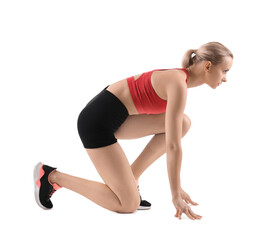 Runner in starting position on white background