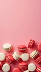 Fototapeta premium Colorful french macarons balancing on pink background