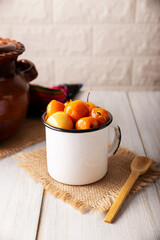 Dulce de Tejocote. Typical Mexican dessert made with Tejocote (Crataegus mexicana), a Mexican fruit in syrup, a fruit widely used in autumn, the Day of the Dead, posadas and the Christmas season.